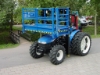 Afbeeldingen van New Holland TN75D Triplo Bouwtractor