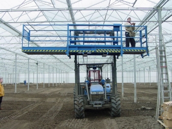 Afbeeldingen van New Holland TN75D Duplo Bouwtractor