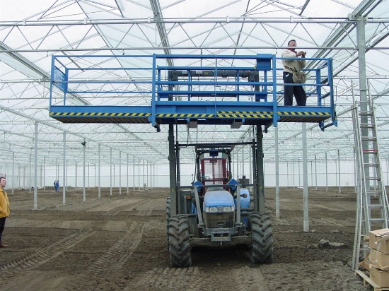 Afbeeldingen van New Holland TN75D Duplo Bouwtractor